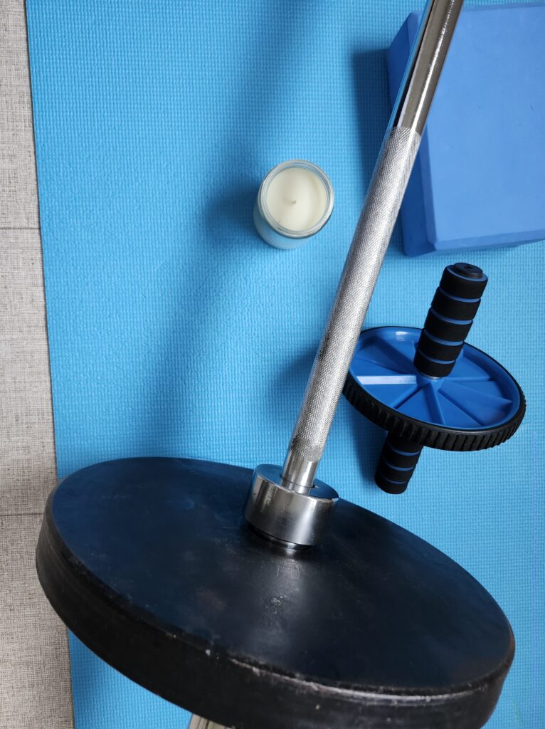 Creating a relaxing environment with a blue mat weights and candle