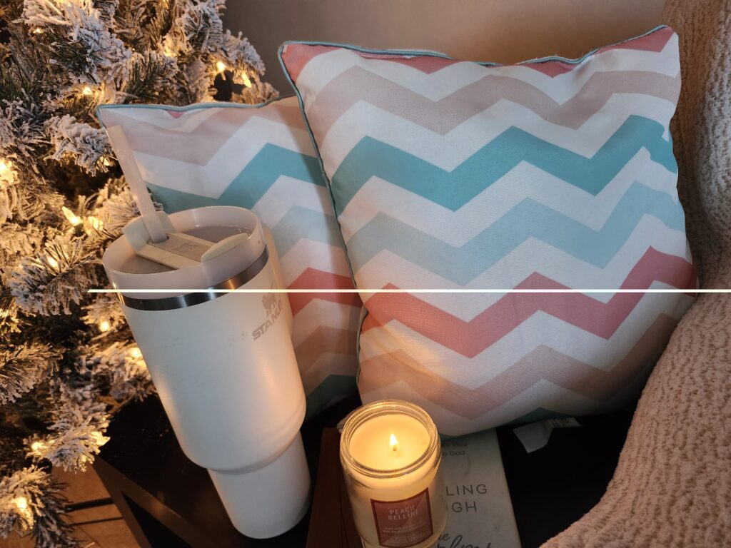 Cozy bedroom with low lights, pillows, water and a candle to relax and rest
